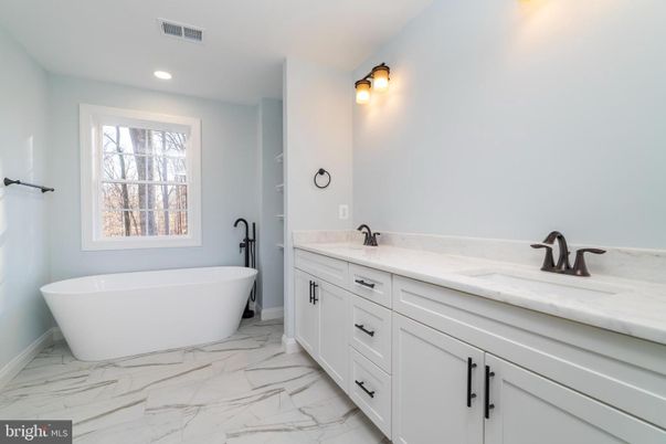 Bathroom, Dual Sink Vanities, Free Standing Baths, Interior, Marble, Recessed Lighting
