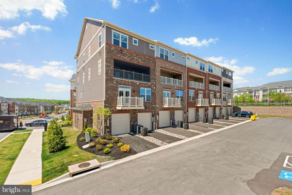 Exterior, Facade, Brick Facade, Condo Building