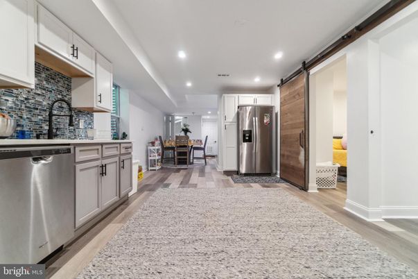 Dining room, Interior, Kitchen, Recessed Lighting, Stainless Steel Appliances, Wood Texture Flooring