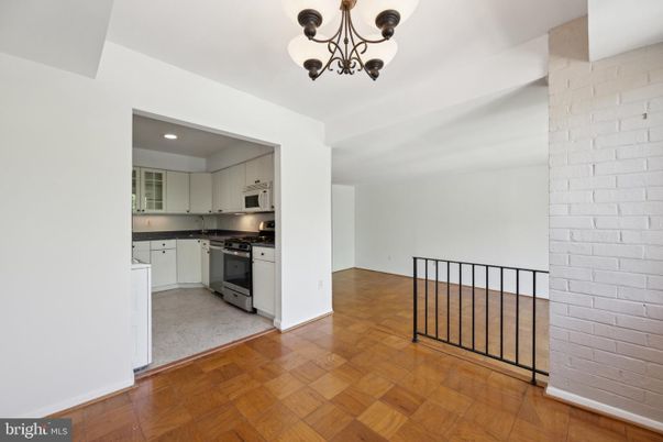 Interior, Kitchen, Recessed Lighting, Stainless Steel Appliances, Stone Walls, Wood Texture Flooring