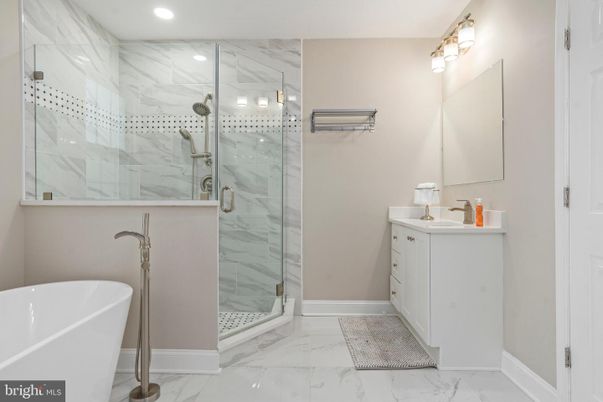 Bathroom, Free Standing Baths, Glass Shower, Interior, Marble, Marble Walls, Recessed Lighting