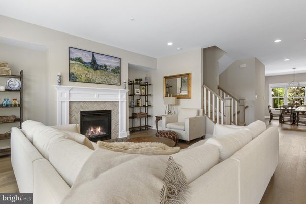 Dining room, Fireplace, Interior, Living room, Pendant Lights, Recessed Lighting, Wood Texture Flooring