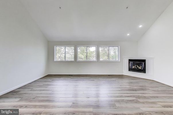 Empty room, Fireplace, Interior, Recessed Lighting, Wood Texture Flooring