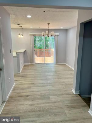 Empty room, Interior, Pendant Lights, Recessed Lighting, Wood Texture Flooring