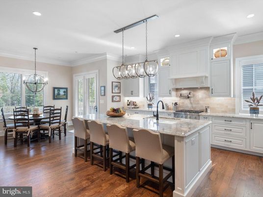 Chandelier, Dining room, Interior, Kitchen, Pendant Lights, Recessed Lighting, Stainless Steel Appliances, Wood Texture Flooring
