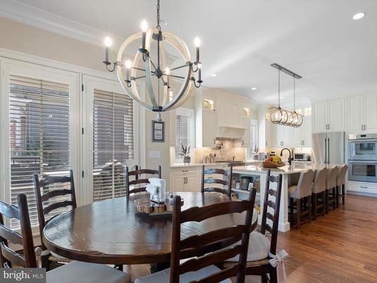 Chandelier, Dining room, Interior, Kitchen, Pendant Lights, Recessed Lighting, Stainless Steel Appliances, Wood Texture Flooring