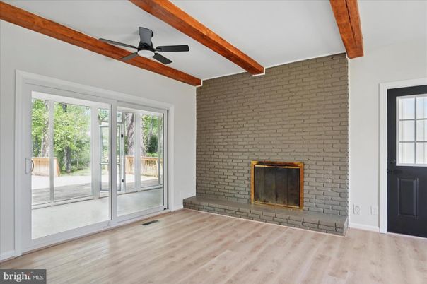 Empty room, Fireplace, Interior, Stone Walls, Wooden Beams, Wood Texture Flooring