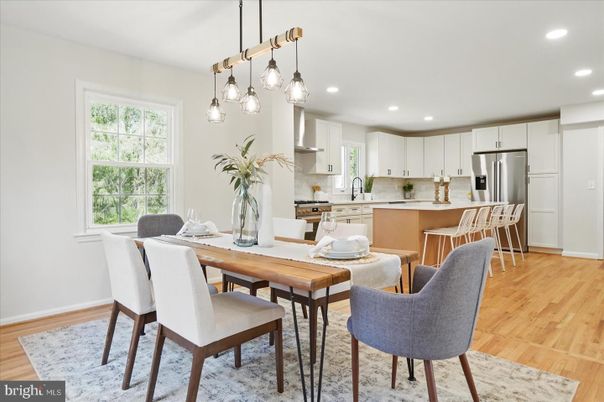 Dining room, Interior, Kitchen, Pendant Lights, Recessed Lighting, Stainless Steel Appliances, Wood Texture Flooring