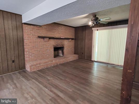 Empty room, Fireplace, Interior, Stone Walls, Wood Texture Flooring