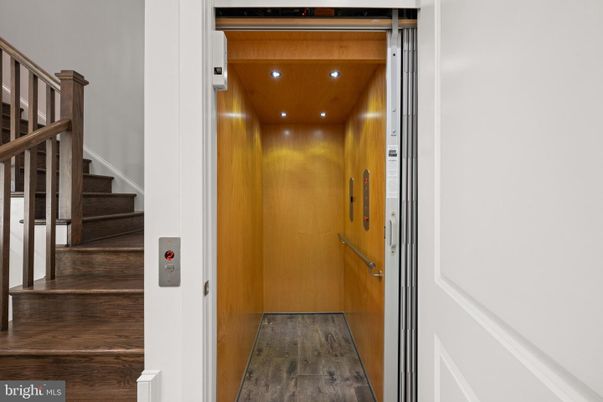 Elevator, Interior, Recessed Lighting, Wooden Ceilings, Wood Texture Flooring, Wooden Walls