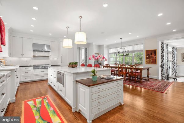 Chandelier, Dining room, Interior, Kitchen, Pendant Lights, Recessed Lighting, Stainless Steel Appliances, Wood Texture Flooring