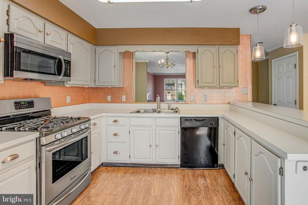 Chandelier, Interior, Kitchen, Pendant Lights, Stainless Steel Appliances, Wood Texture Flooring