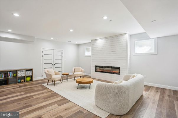 Fireplace, Interior, Living room, Recessed Lighting, Wood Texture Flooring