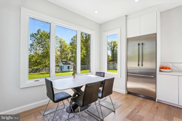 Dining room, Interior, Kitchen, Recessed Lighting, Stainless Steel Appliances, Wood Texture Flooring