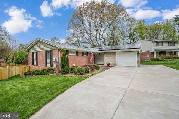 Attached, Exterior, Facade, Brick Facade, Solar Panels, Ranch