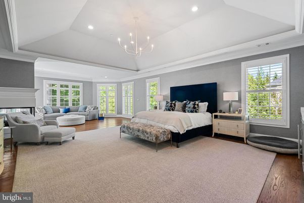 Bedroom, Chandelier, Fireplace, Interior, Pendant Lights, Recessed Lighting, Wood Texture Flooring