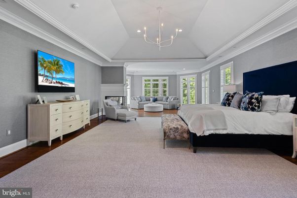 Bedroom, Chandelier, Fireplace, Interior, Recessed Lighting, Wood Texture Flooring