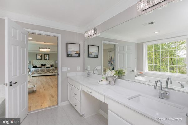 Bathroom, Dual Sink Vanities, Interior, Recessed Lighting, Wood Texture Flooring