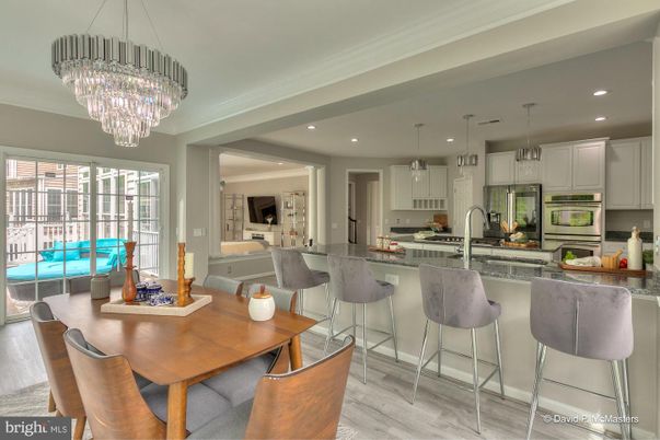 Chandelier, Dining room, Interior, Kitchen, Pendant Lights, Recessed Lighting, Stainless Steel Appliances, Wood Texture Flooring