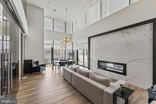 Chandelier, Dining room, Fireplace, Interior, Living room, Marble Walls, Pendant Lights, Recessed Lighting, Wood Texture Flooring