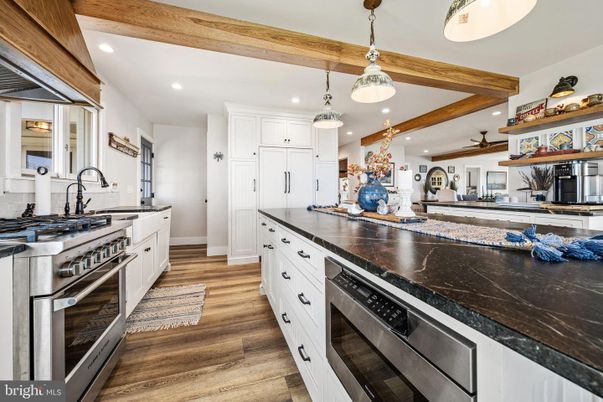 Interior, Kitchen, Pendant Lights, Recessed Lighting, Stainless Steel Appliances, Wooden Beams, Wood Texture Flooring