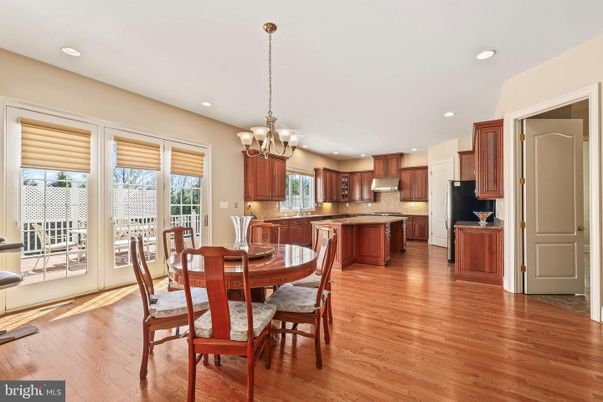 Chandelier, Dining room, Interior, Kitchen, Recessed Lighting, Stainless Steel Appliances, Wood Texture Flooring