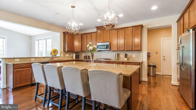 Chandelier, Interior, Kitchen, Pendant Lights, Recessed Lighting, Stainless Steel Appliances, Wood Texture Flooring