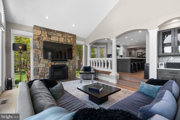 Fireplace, Interior, Kitchen, Living room, Recessed Lighting, Stone Walls, Wood Texture Flooring