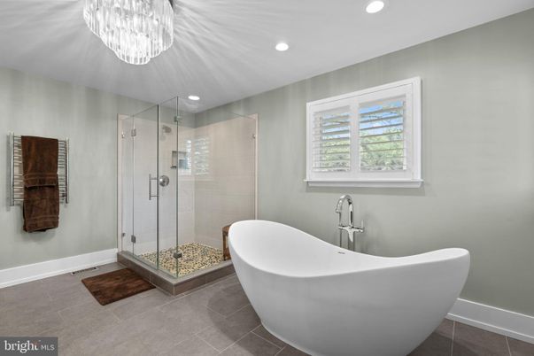 Bathroom, Chandelier, Free Standing Baths, Glass Shower, Interior, Recessed Lighting