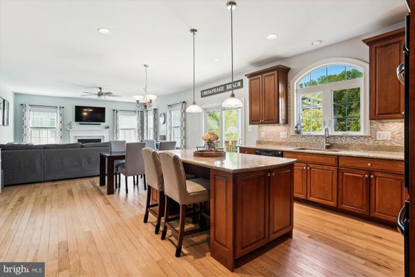 Dining room, Fireplace, Interior, Kitchen, Living room, Pendant Lights, Recessed Lighting, Wood Texture Flooring