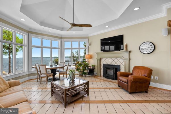Dining room, Fireplace, Interior, Living room, Recessed Lighting, Water