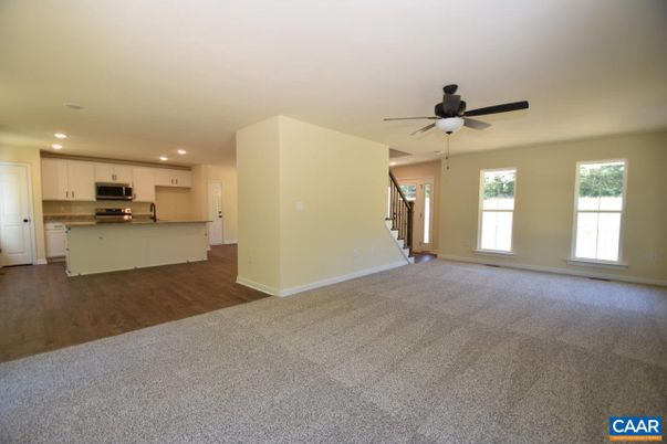 Empty room, Interior, Kitchen, Recessed Lighting, Stainless Steel Appliances, Wood Texture Flooring