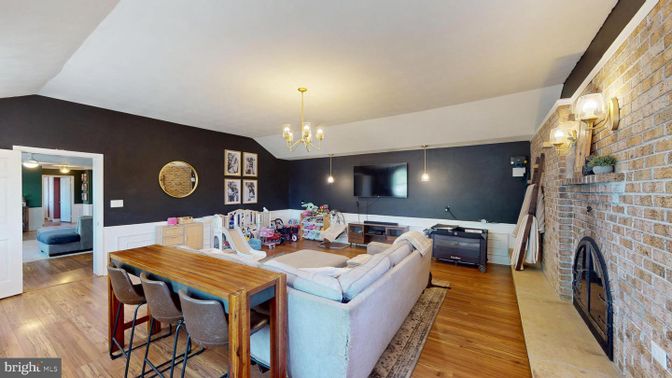 Dining room, Fireplace, Interior, Living room, Pendant Lights, Stone Walls, Wood Texture Flooring