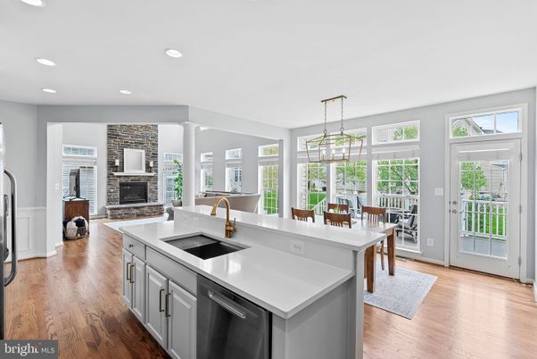 Dining room, Fireplace, Interior, Kitchen, Pendant Lights, Recessed Lighting, Stone Walls, Wood Texture Flooring