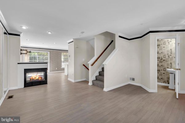 Empty room, Fireplace, Interior, Recessed Lighting, Wood Texture Flooring