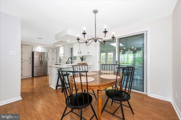 Chandelier, Dining room, Interior, Kitchen, Recessed Lighting, Stainless Steel Appliances, Wood Texture Flooring