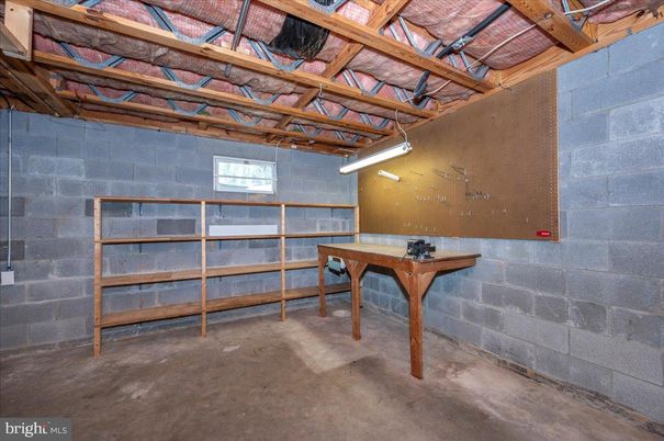 Garage, Interior, Stone Walls, Wooden Beams