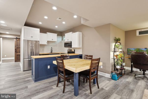 Dining room, Interior, Kitchen, Recessed Lighting, Stainless Steel Appliances, Wood Texture Flooring