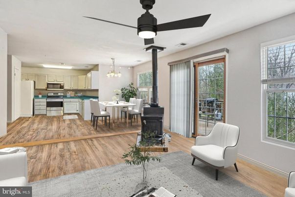 Chandelier, Dining room, Interior, Kitchen, Stainless Steel Appliances, Wood Texture Flooring