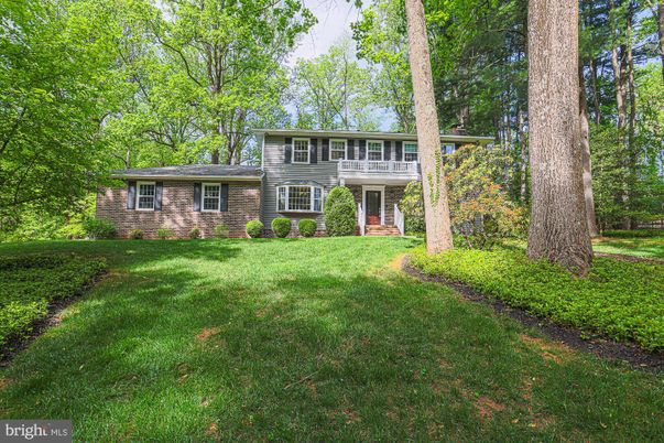 Backyard, Exterior, Facade, Brick Facade, Raised Ranch