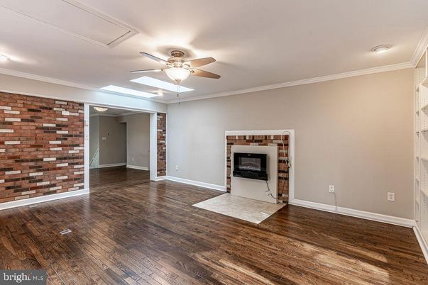 Empty room, Fireplace, Interior, Stone Walls, Wood Texture Flooring