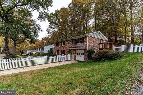 Attached, Backyard, Exterior, Facade, Brick Facade, None