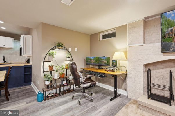 Fireplace, Home Office, Interior, Recessed Lighting, Stone Walls, Wood Texture Flooring