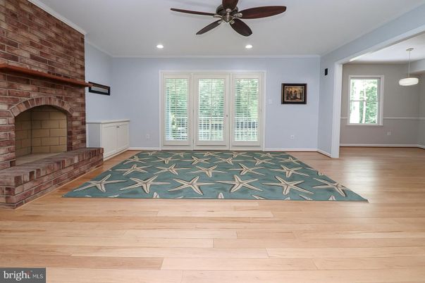 Empty room, Fireplace, Interior, Pendant Lights, Recessed Lighting, Stone Walls, Wood Texture Flooring