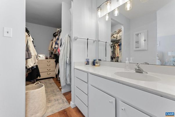 Bathroom, Dual Sink Vanities, Interior, Walk-in Closets, Wood Texture Flooring