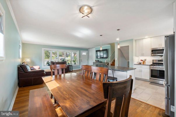 Dining room, Interior, Kitchen, Living room, Pendant Lights, Piano, Stainless Steel Appliances, Wood Texture Flooring