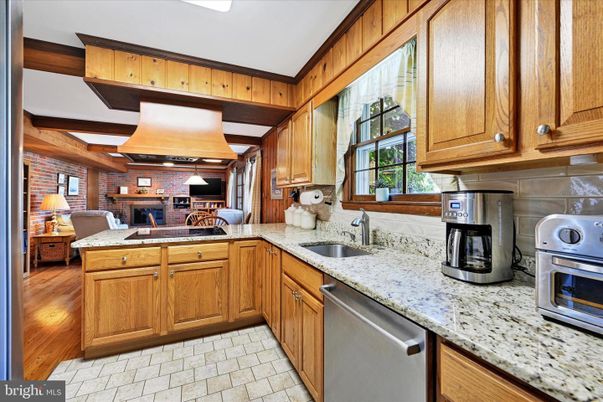 Dining room, Interior, Kitchen, Pendant Lights, Stainless Steel Appliances, Stone Walls, Wood Texture Flooring