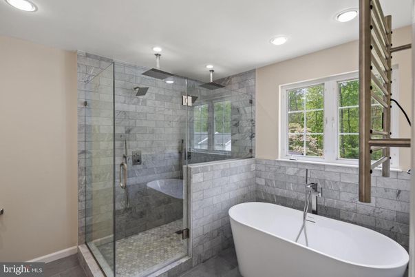 Bathroom, Free Standing Baths, Glass Shower, Interior, Recessed Lighting, Stone Walls