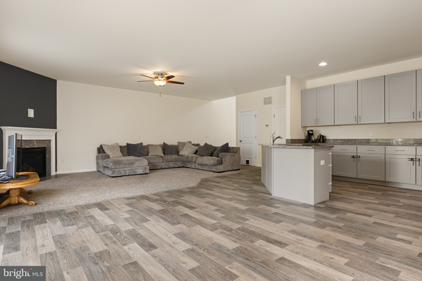 Fireplace, Interior, Kitchen, Recessed Lighting, Wood Texture Flooring