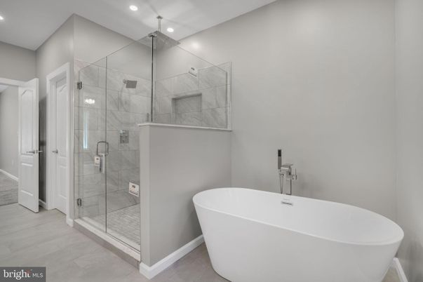 Bathroom, Free Standing Baths, Glass Shower, Interior, Marble Walls, Recessed Lighting